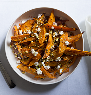 Roasted Sweet Potato Wedges with Wonderful Pistachios, Goat Cheese & Pomegranate Glaze